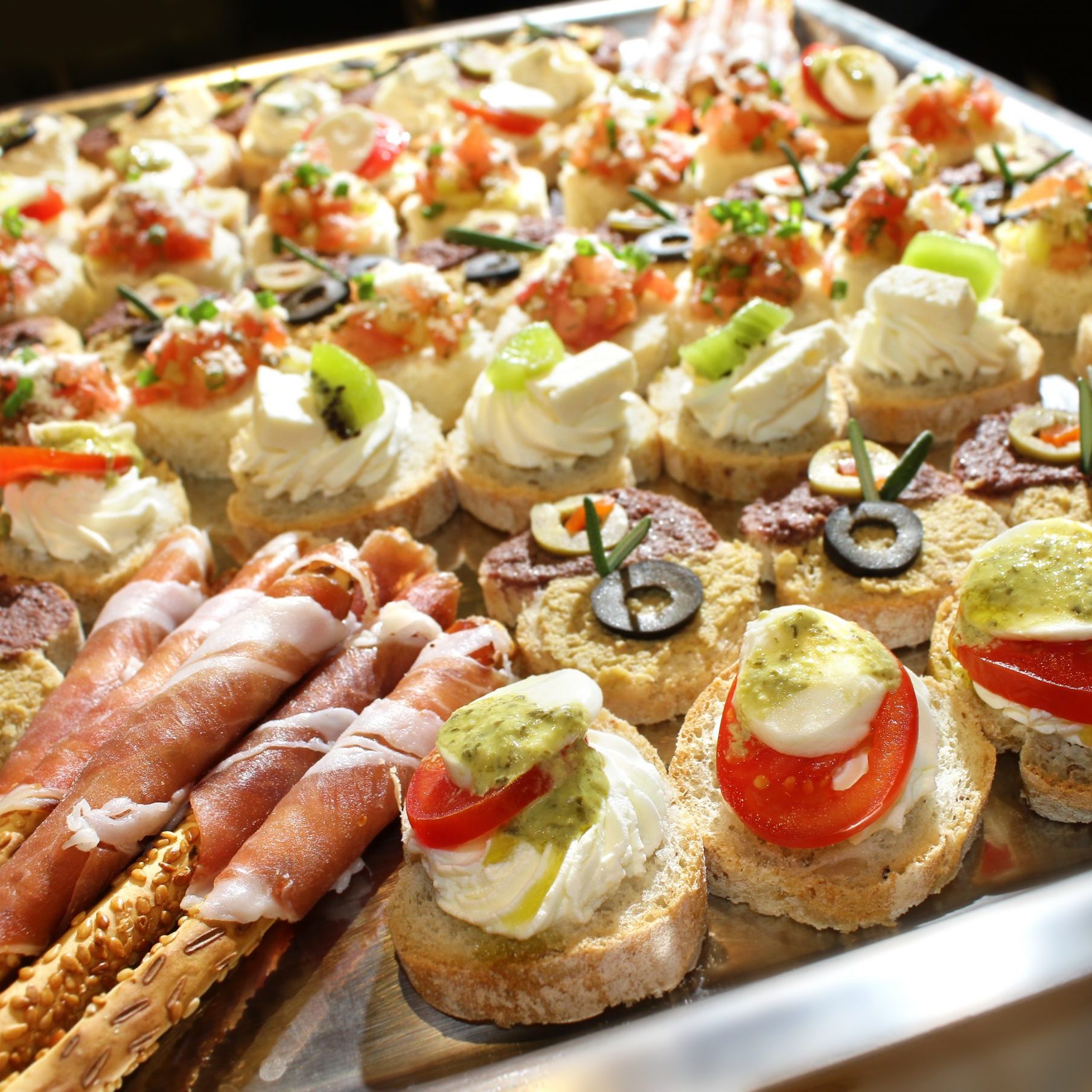 Variety of finger food on catering event. Shalloe focus