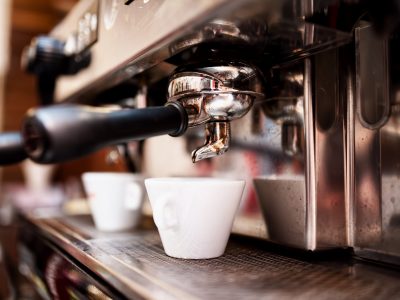 Espresso machine making coffee in pub, bar, restaurant